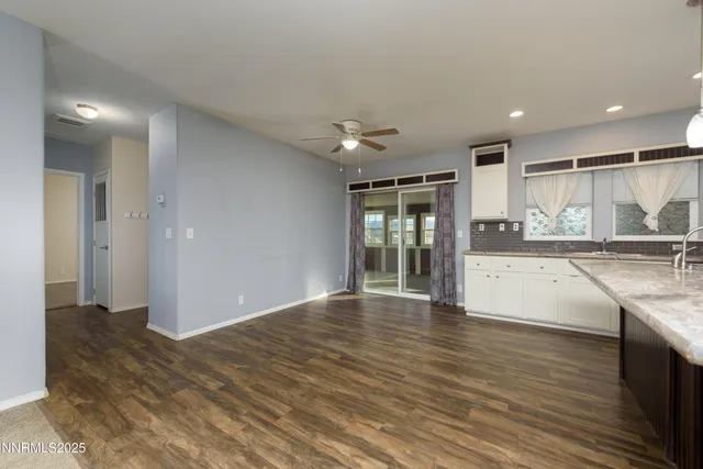 a big room with windows and closet
