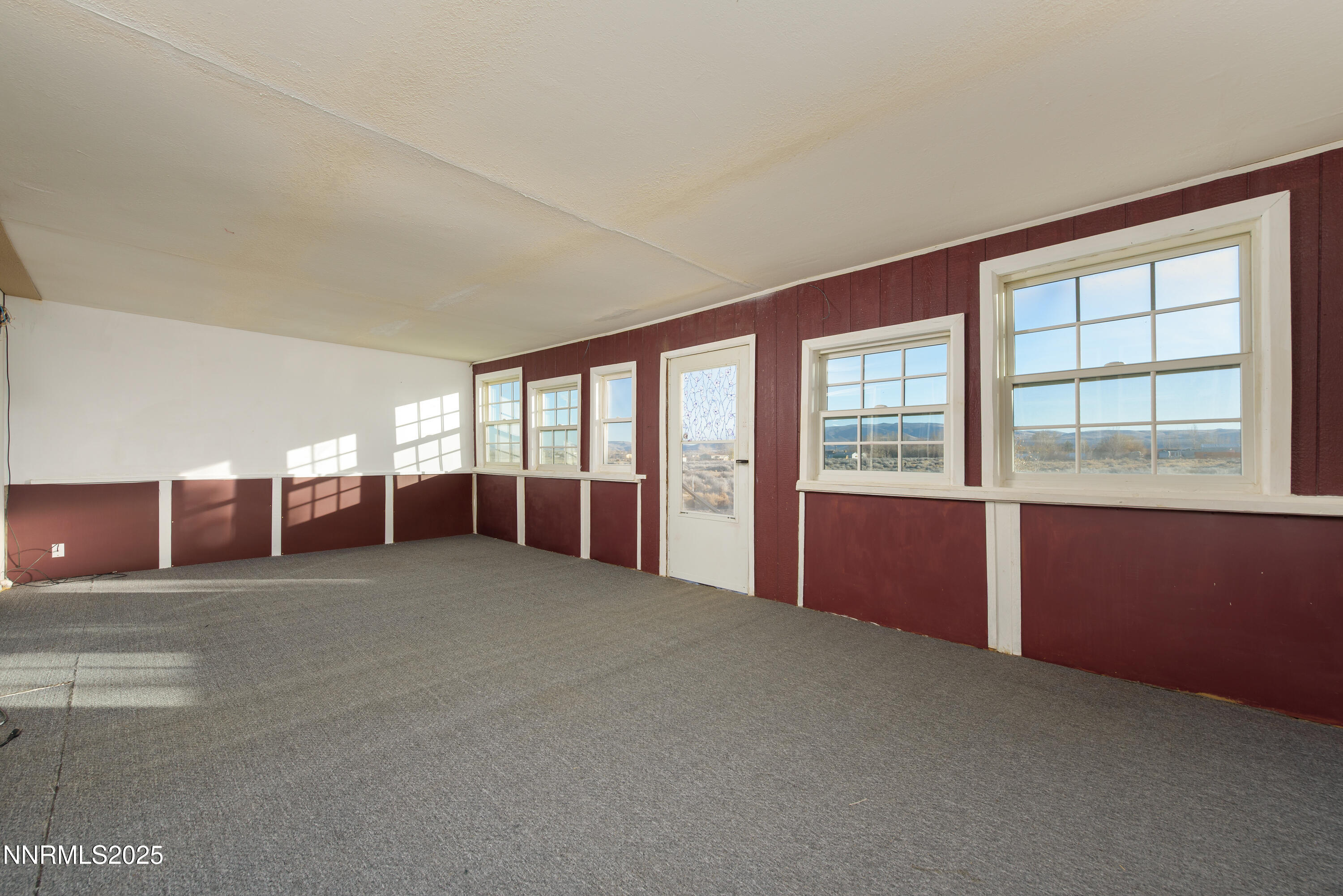 2595 4th Street Silver Springs, NV 89429 - Photo 20 of 54 a big room with windows and closet