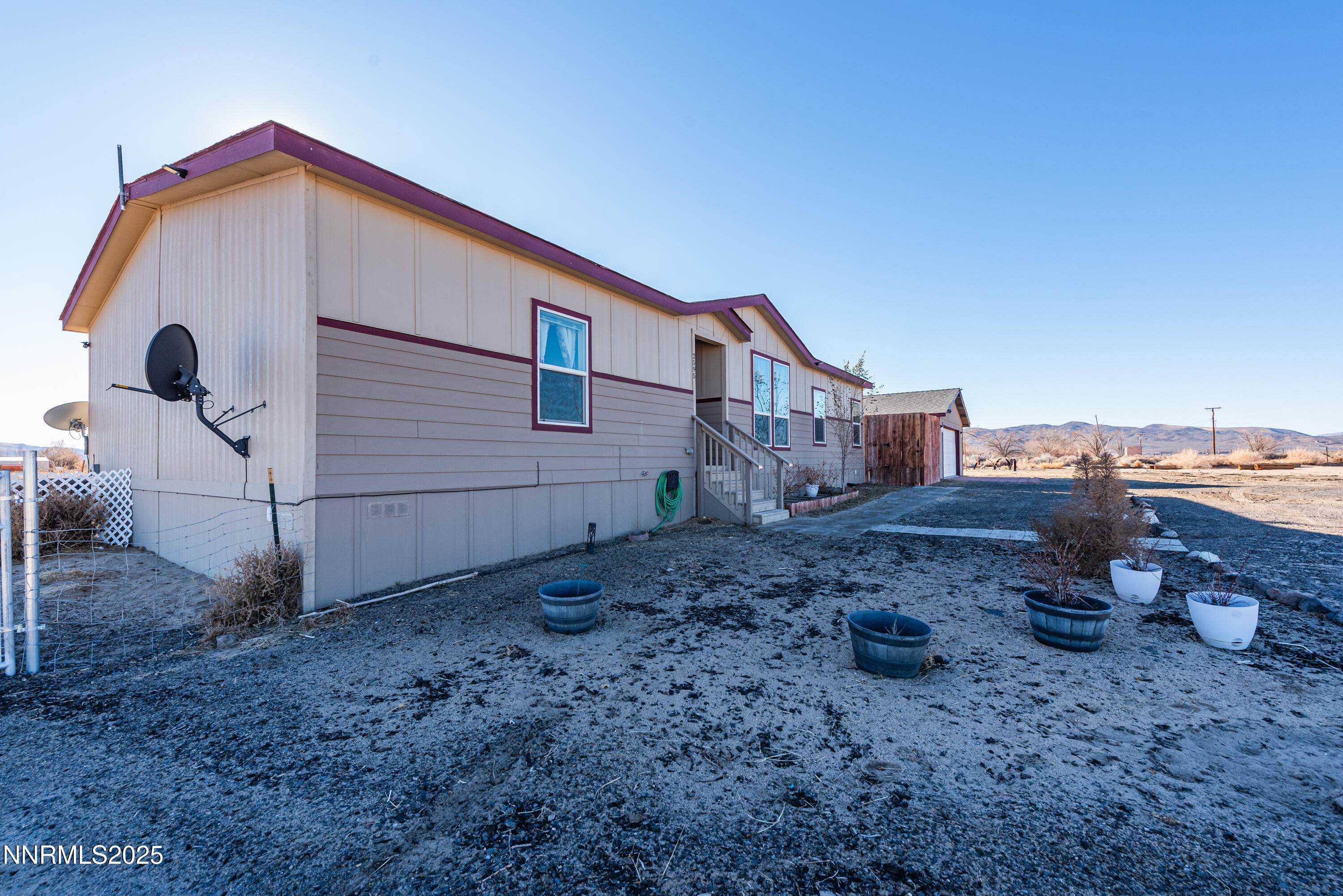 2595 4th Street Silver Springs, NV 89429 - Photo 3 of 54 a house view with a backyard space