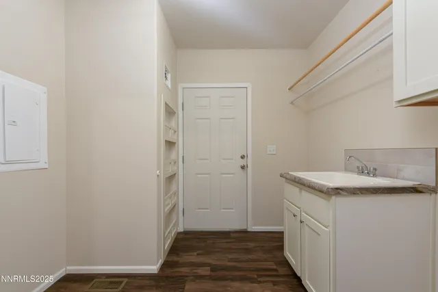 a view of a bathroom from a hallway