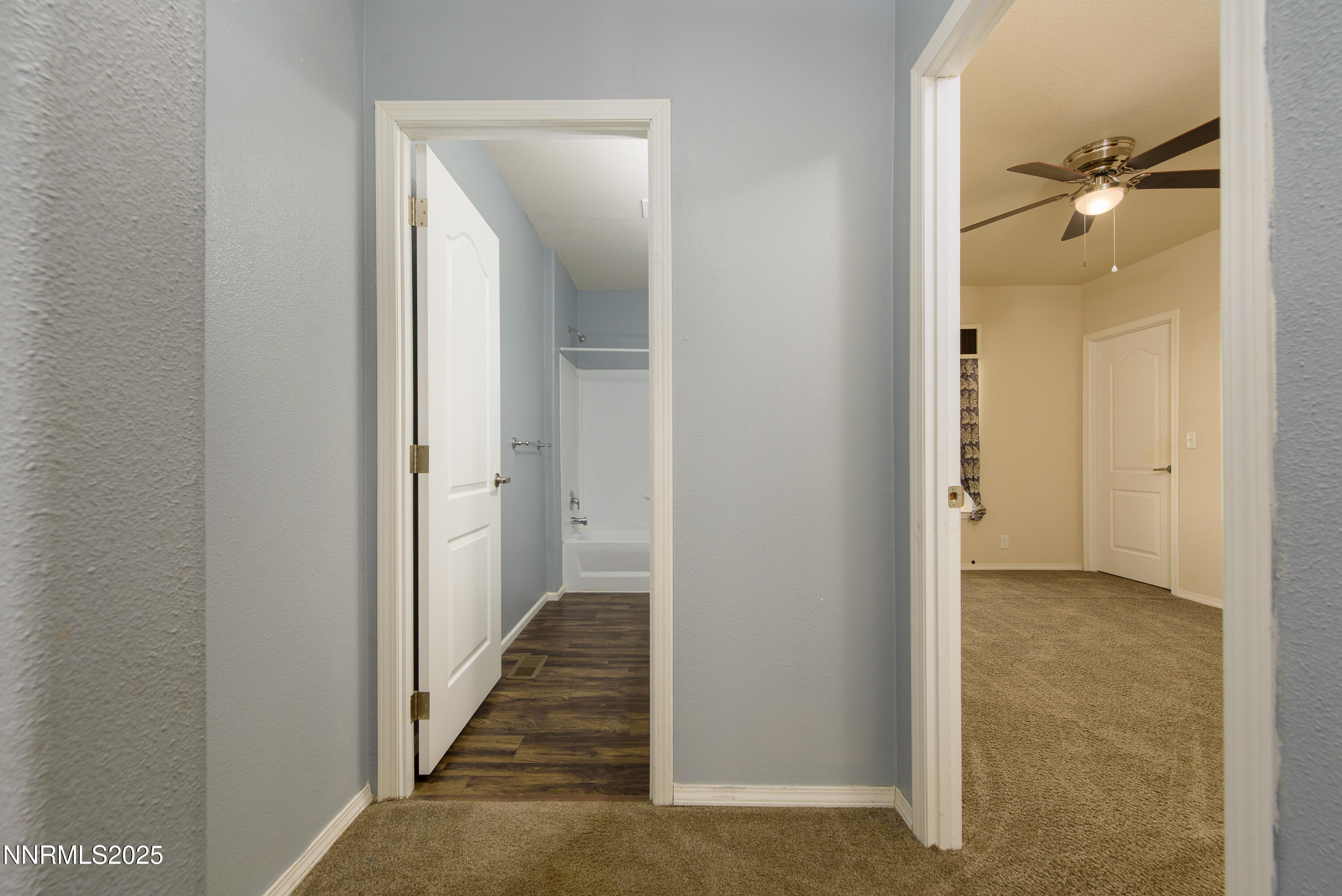 2595 4th Street Silver Springs, NV 89429 - Photo 33 of 54 a view of a bathroom from a hallway