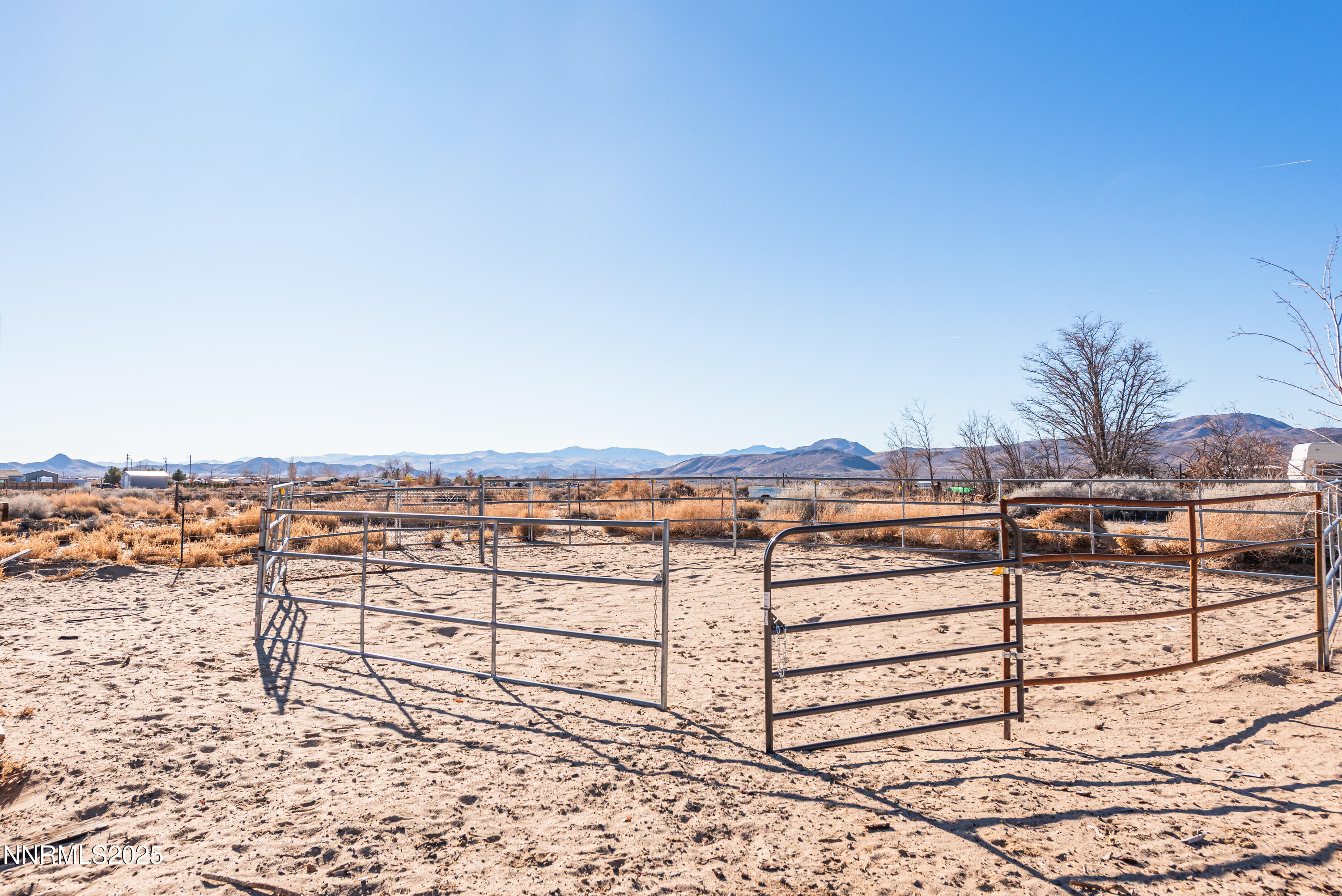 2595 4th Street Silver Springs, NV 89429 - Photo 43 of 54 a view of a terrace with a bench