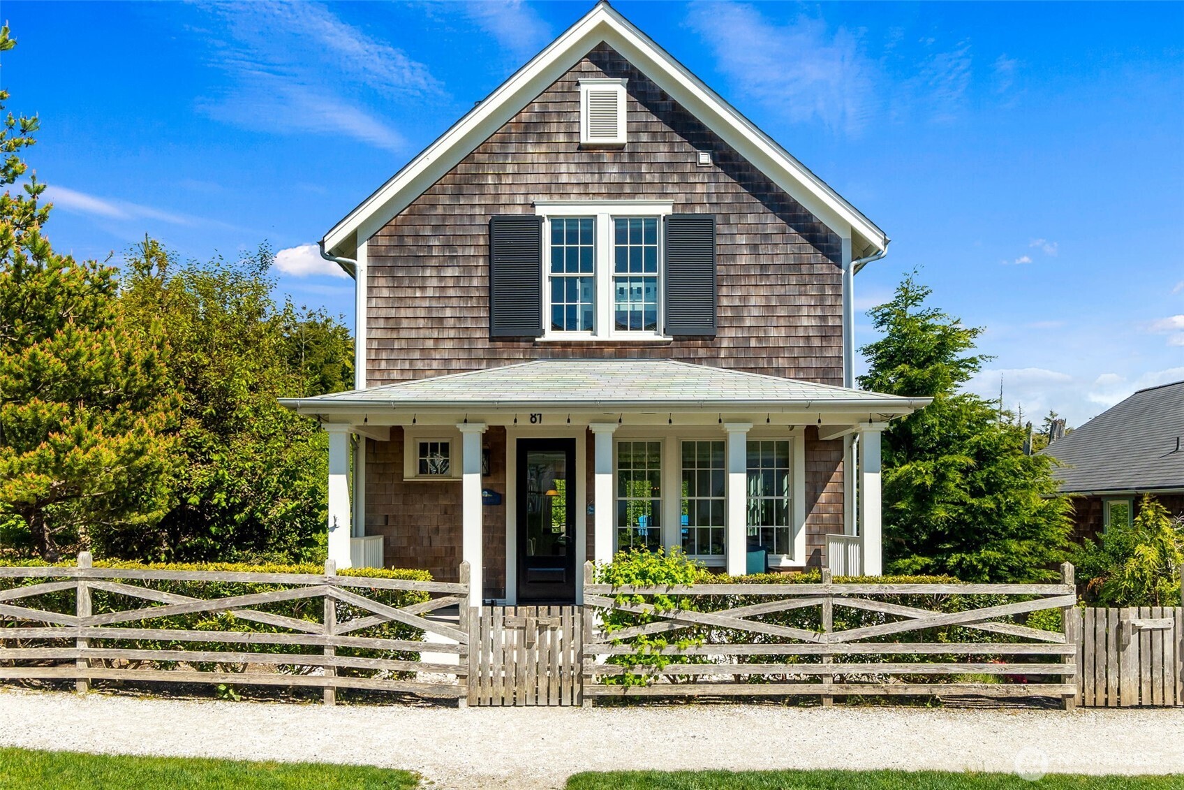 81 Compass Street Pacific Beach, WA 98571 - Photo 1 of 40 a front view of a house with a porch