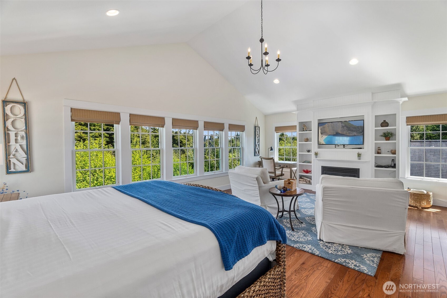 81 Compass Street Pacific Beach, WA 98571 - Photo 17 of 40 a bed sitting in a spacious bedroom next to a window