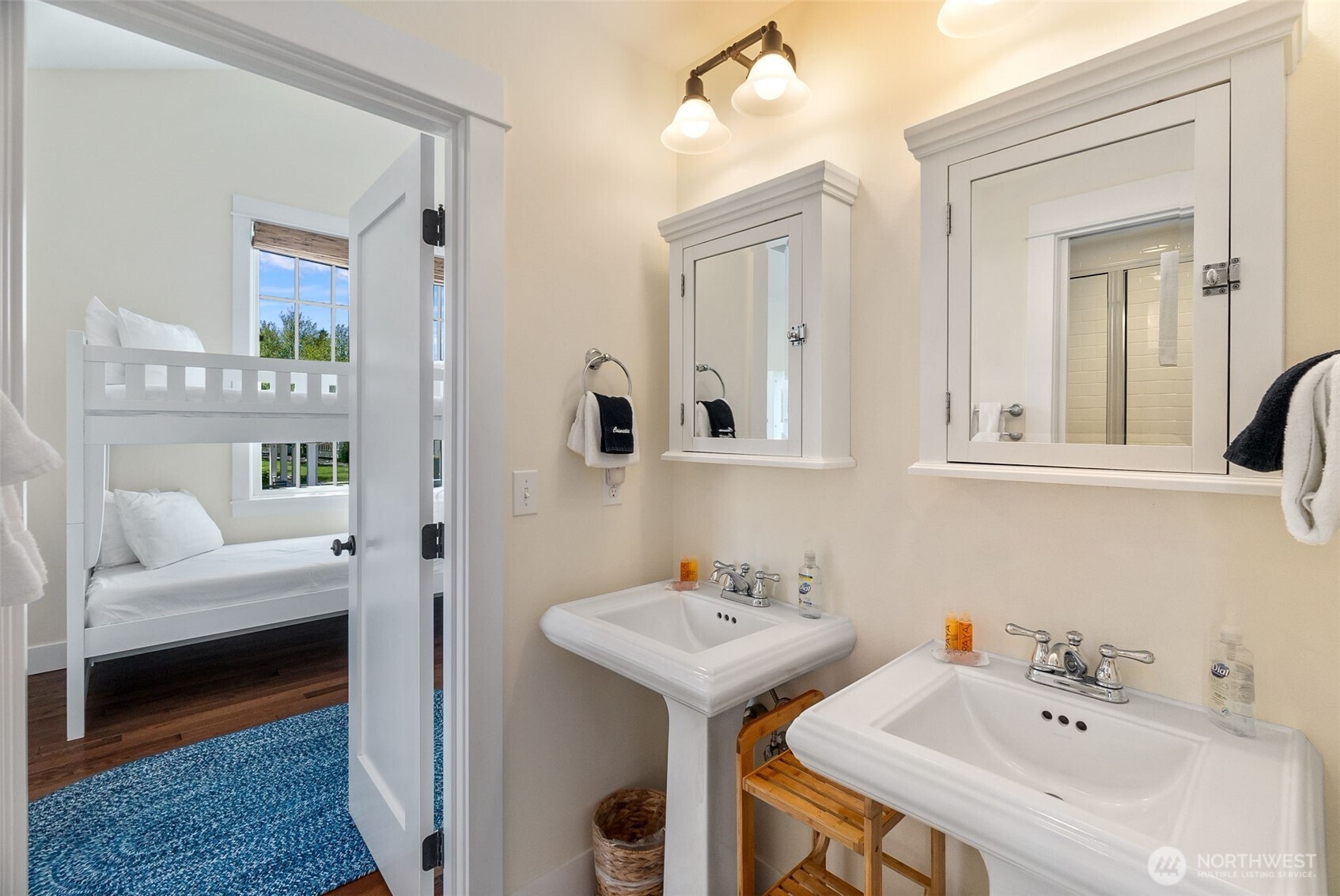 81 Compass Street Pacific Beach, WA 98571 - Photo 20 of 40 a en suite bathroom with a sink and a mirror