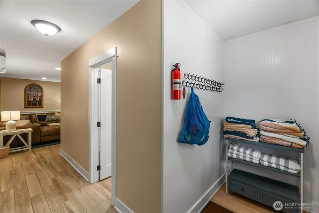 a room with furniture and a wooden floor