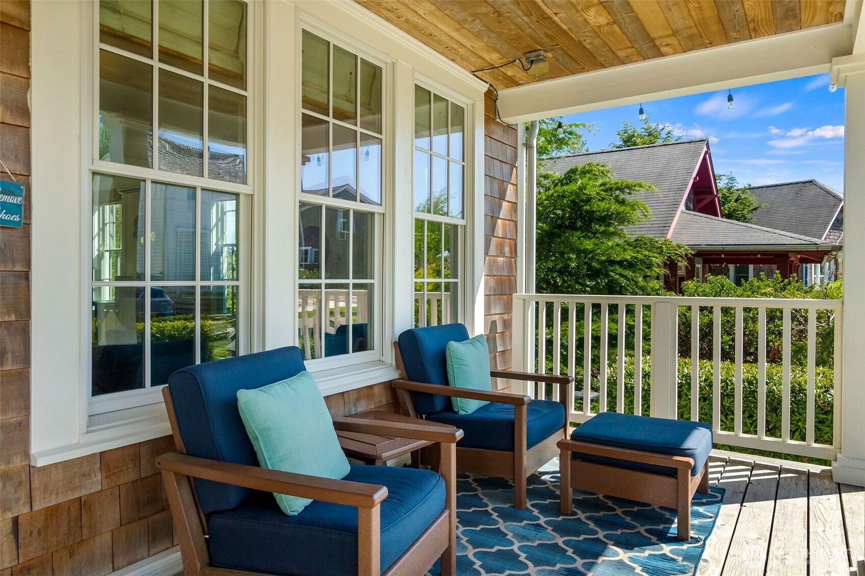 81 Compass Street Pacific Beach, WA 98571 - Photo 3 of 40 a balcony with furniture and wooden floor