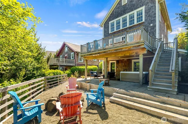 a view of a chairs and table in the patio