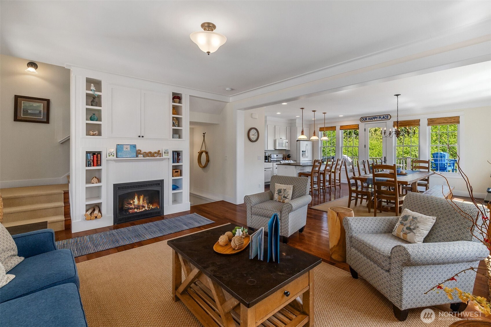81 Compass Street Pacific Beach, WA 98571 - Photo 6 of 40 a living room with furniture fireplace and a table