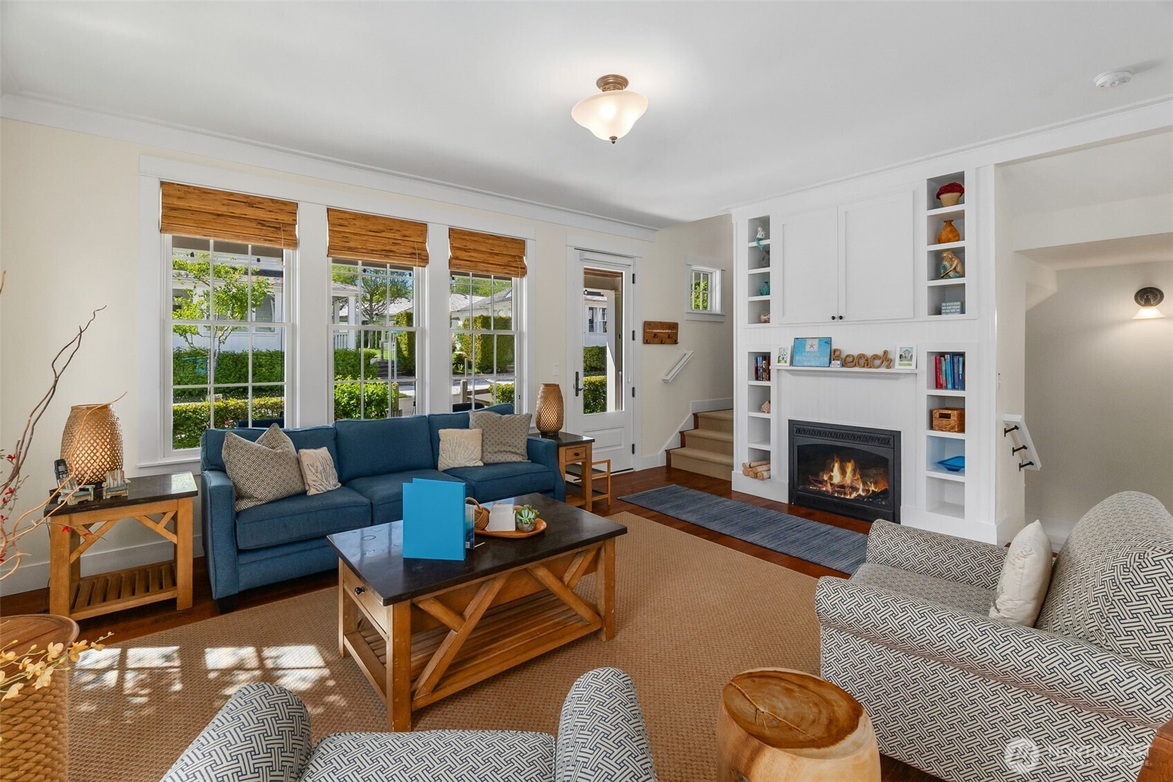 81 Compass Street Pacific Beach, WA 98571 - Photo 7 of 40 a living room with furniture and a fireplace