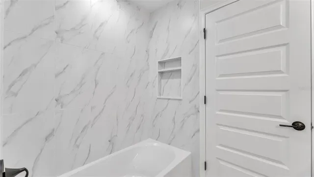 a bathroom with a bathtub