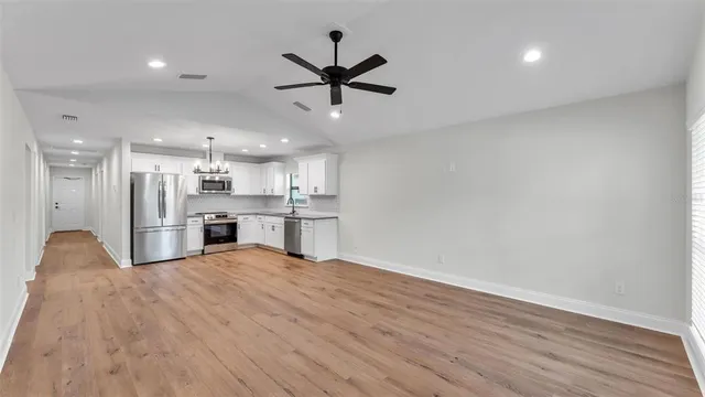 a view of kitchen with wooden floor