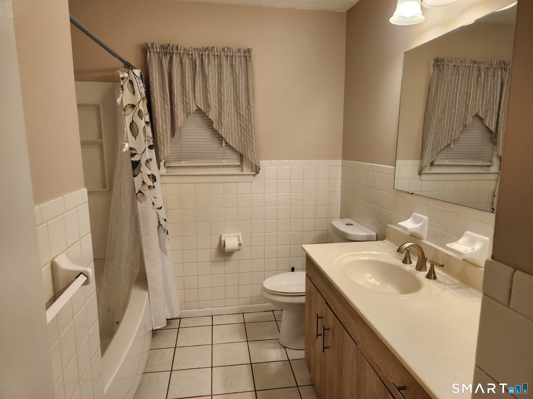 45 Fieldstream Drive Waterbury, CT 06704 - Photo 11 of 16 a bathroom with a sink a toilet and shower