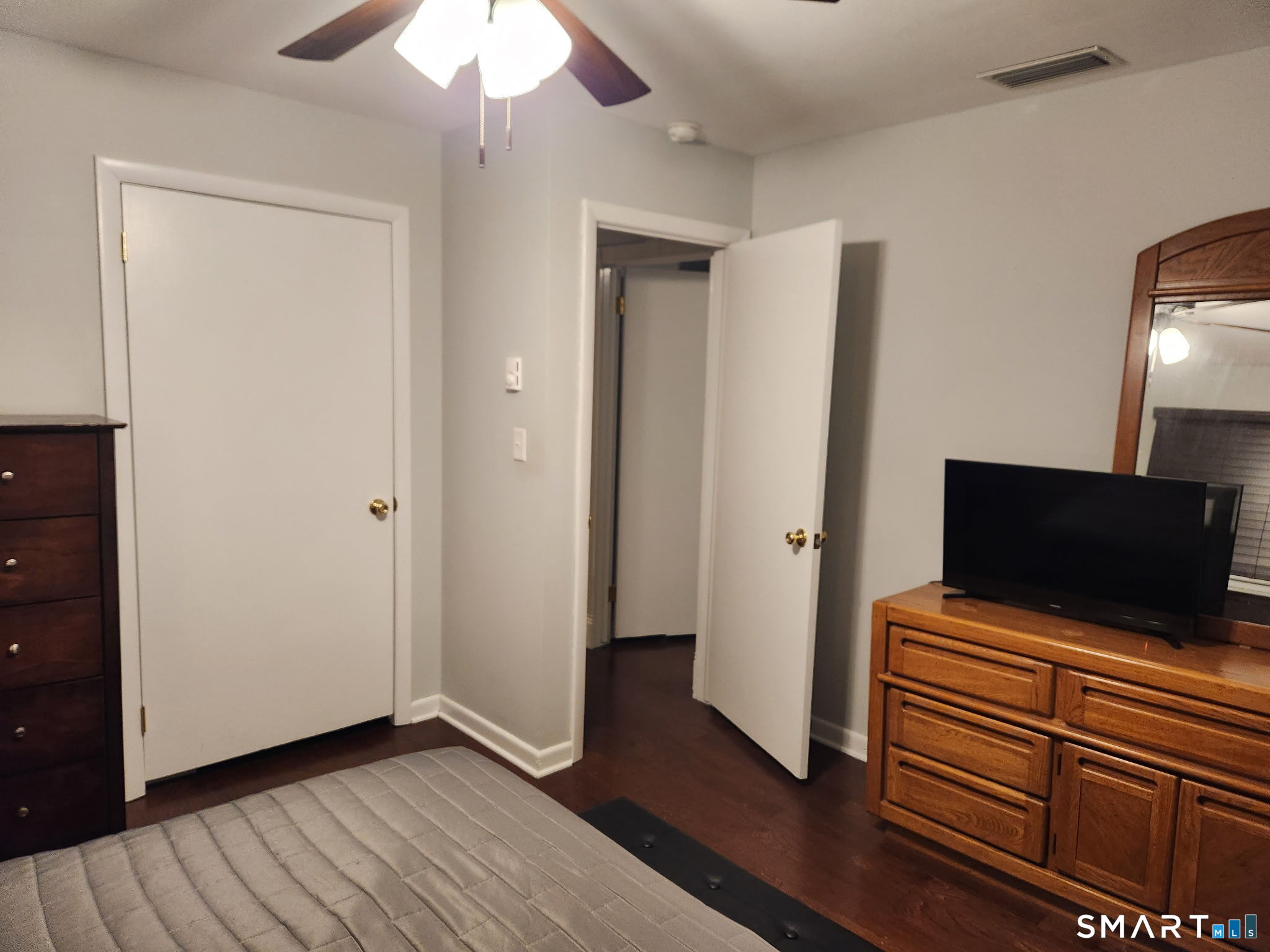 45 Fieldstream Drive Waterbury, CT 06704 - Photo 8 of 16 a view of room with wooden floor and ceiling fan