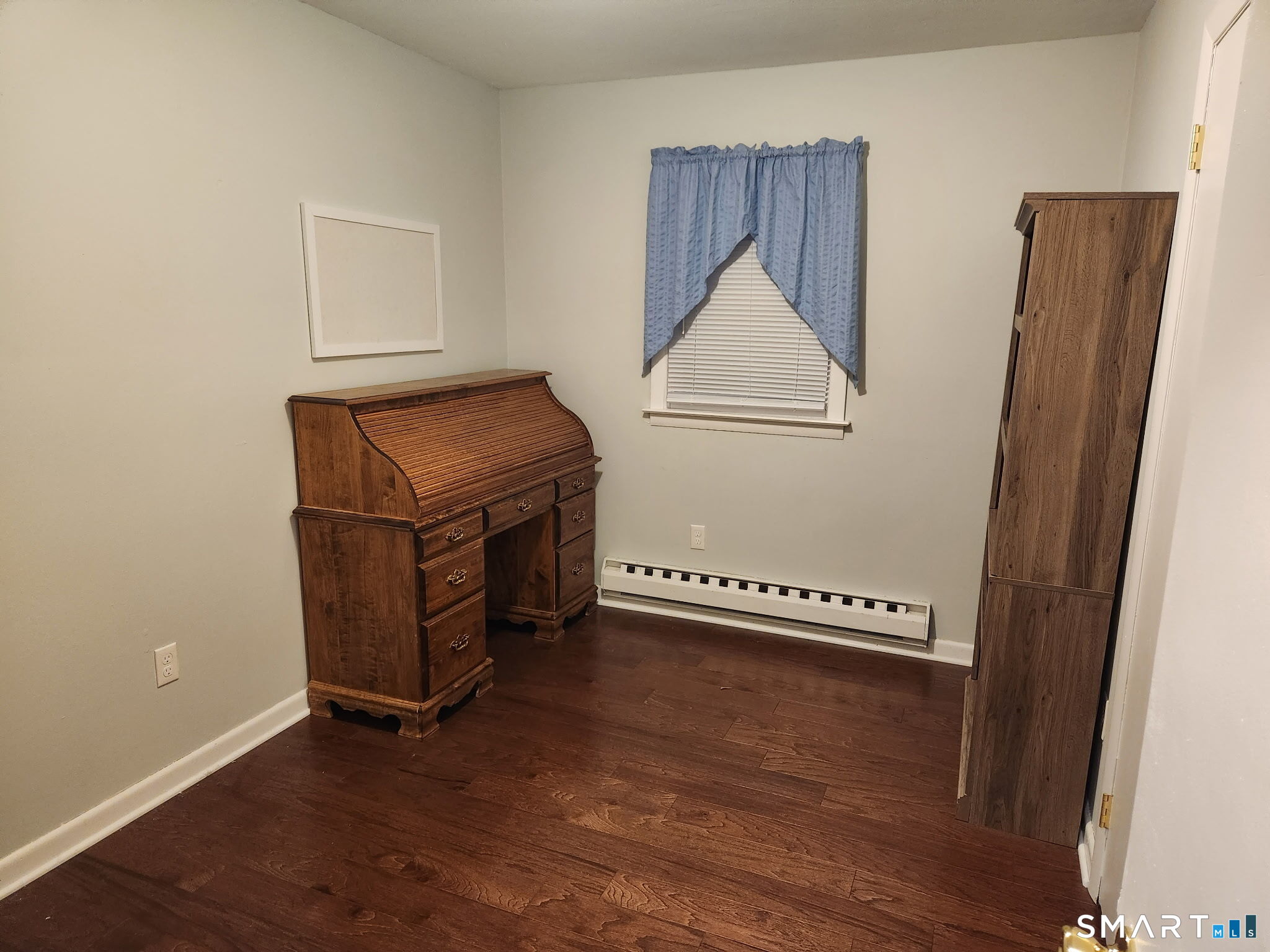 45 Fieldstream Drive Waterbury, CT 06704 - Photo 9 of 16 an empty room with wooden floor and mirror