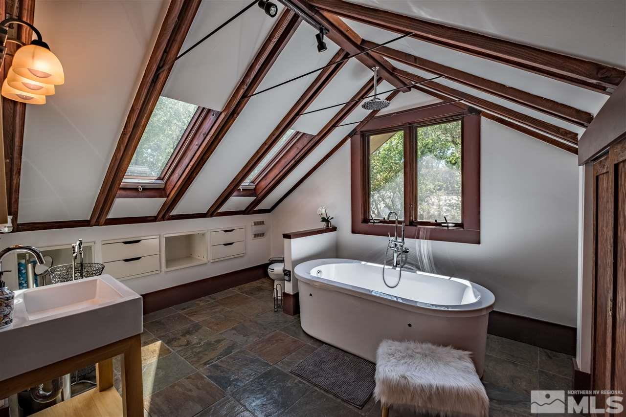 588 Marsh Avenue Reno, NV 89509 - Photo 16 of 28 a spacious bathroom with a sink and mirror