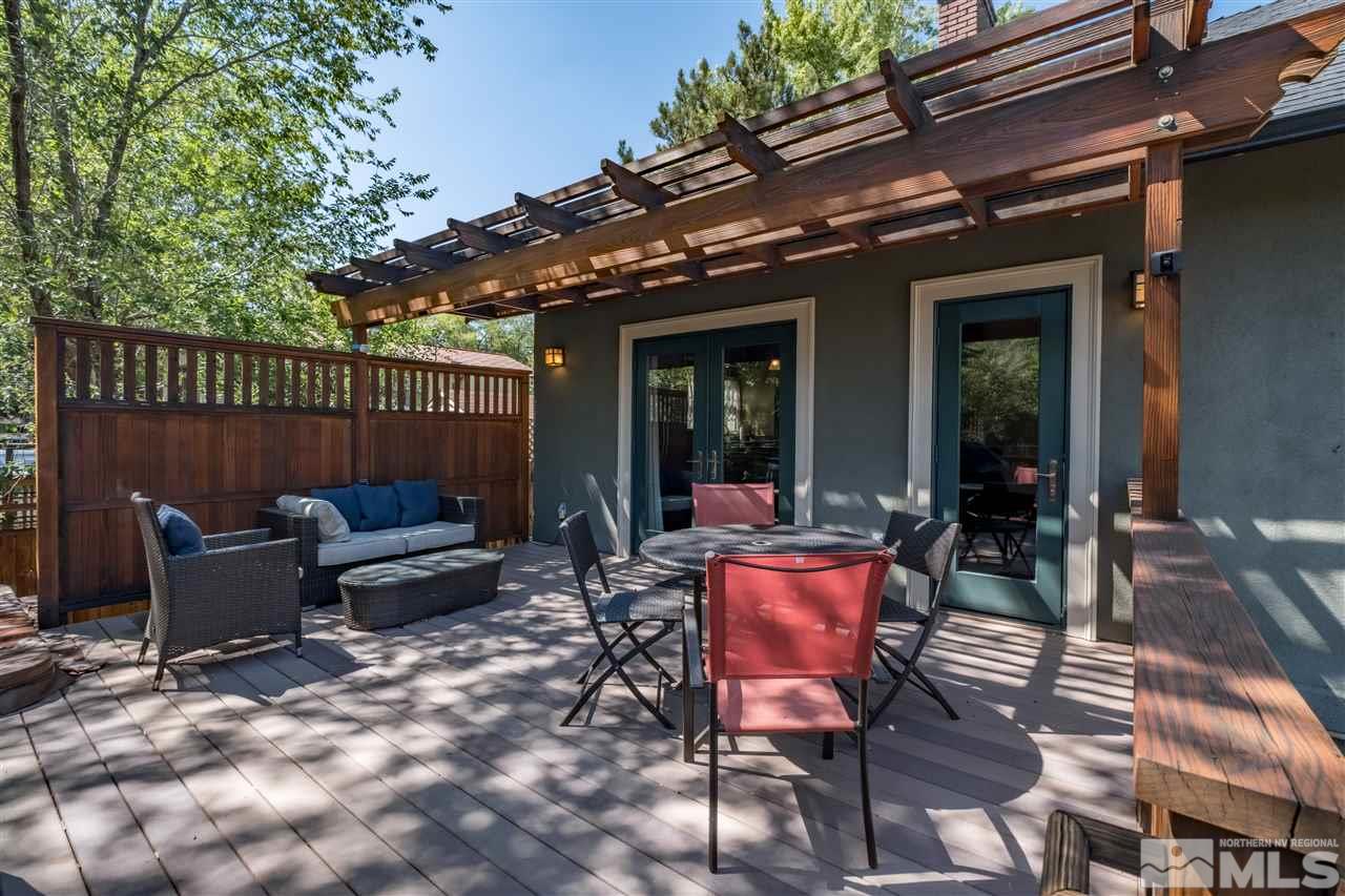 588 Marsh Avenue Reno, NV 89509 - Photo 21 of 28 a view of a dinning tables and chairs in the patio in front of a house