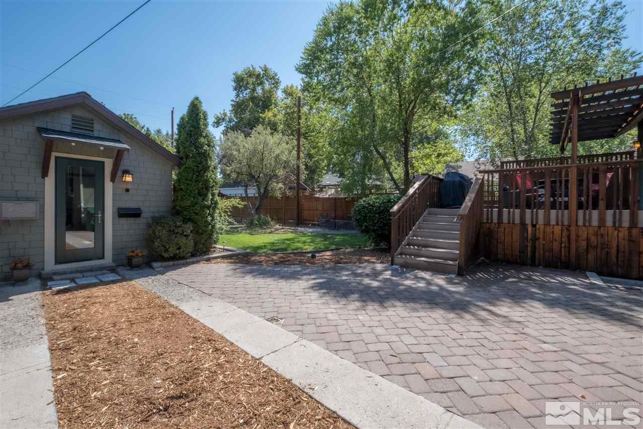 588 Marsh Avenue Reno, NV 89509 - Photo 23 of 28 a view of a backyard with wooden fence and plants