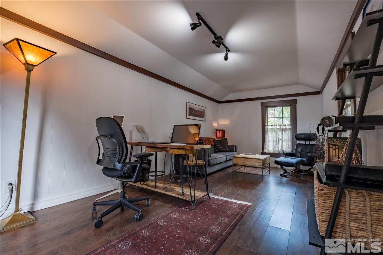 588 Marsh Avenue Reno, NV 89509 - Photo 26 of 28 a living room with furniture and a wooden floor