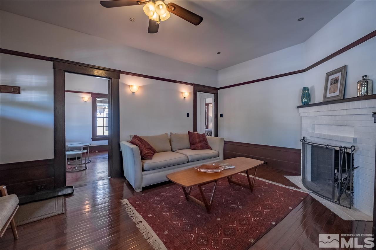 588 Marsh Avenue Reno, NV 89509 - Photo 5 of 28 a living room with furniture and a fireplace