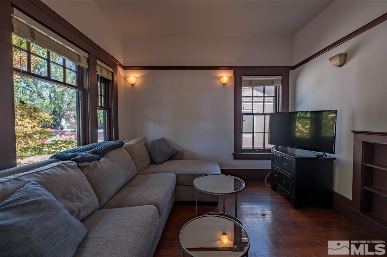 588 Marsh Avenue Reno, NV 89509 - Photo 6 of 28 a living room with furniture and a flat screen tv