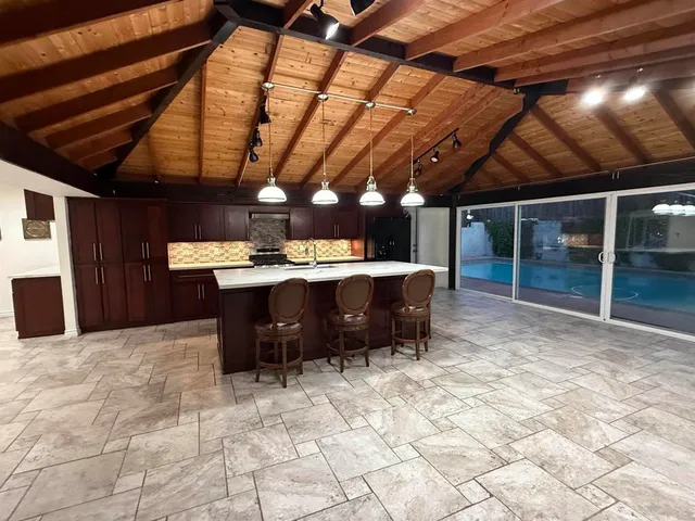 a view of a porch with furniture