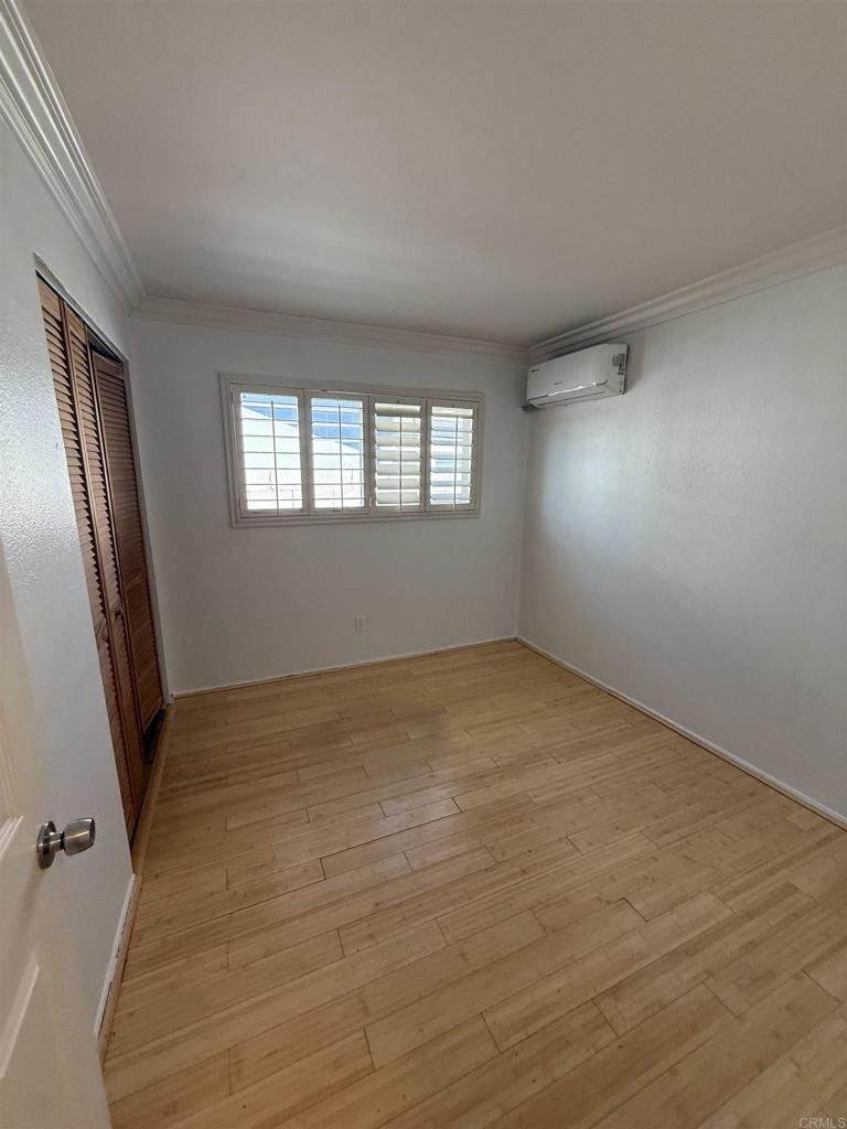 8859 Kelburn Avenue Spring Valley, CA 91977 - Photo 10 of 15 an empty room with windows