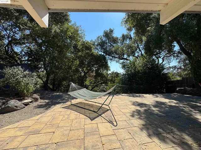 a view of a back yard of the house