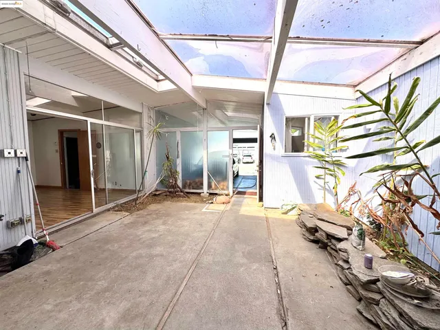 a view of an entryway with a door