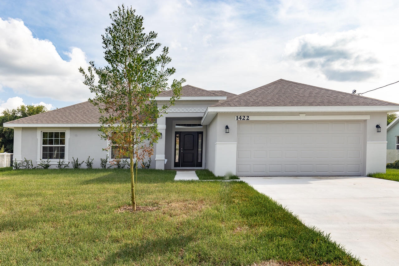5612 Raintree Trail Fort Pierce, FL 34982 - Photo 1 of 13 Front of the house