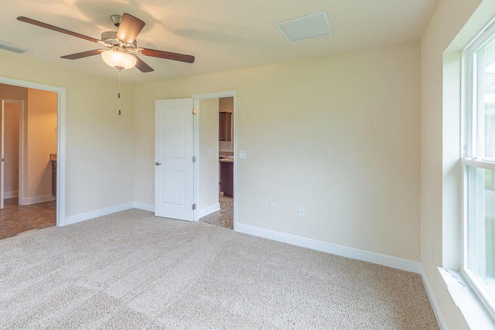 5612 Raintree Trail Fort Pierce, FL 34982 - Photo 7 of 13 1755 master bedroom