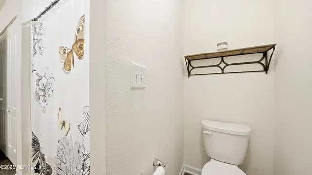 a bathroom with 2 sink and a mirror