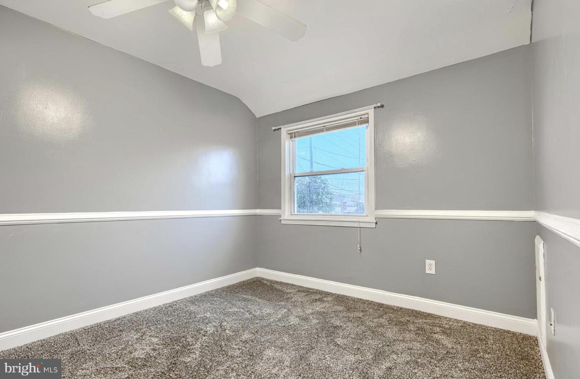 1918 Larkhall Road Baltimore, MD 21222 - Photo 17 of 25 an empty room with a window