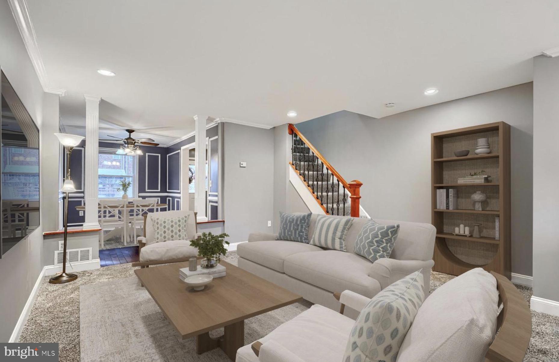 1918 Larkhall Road Baltimore, MD 21222 - Photo 5 of 25 a living room with furniture a rug and a wooden floor