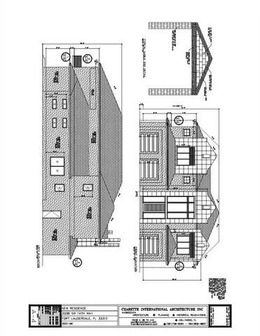 a black and white photo of a living room