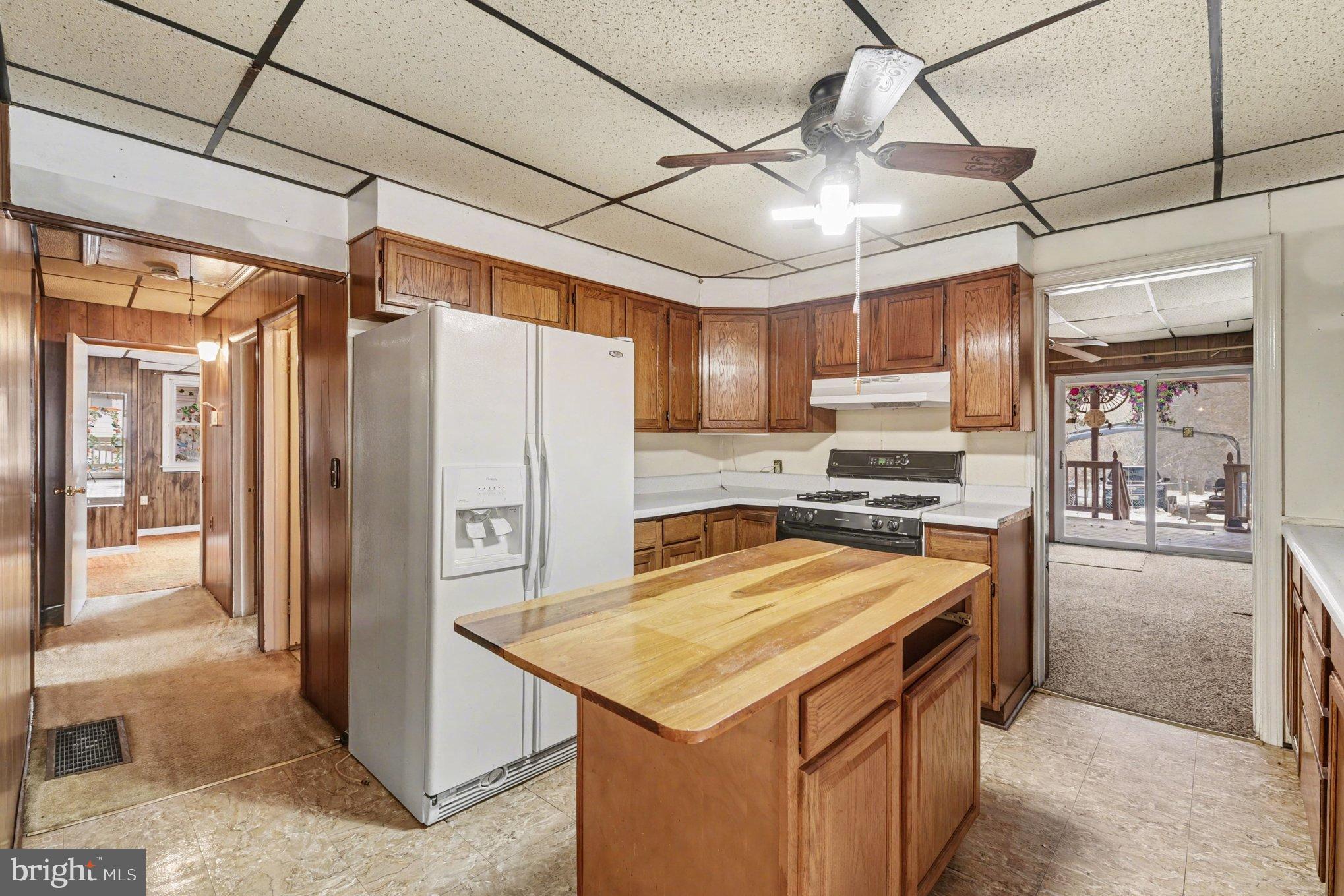 1433 Old Philadelphia Road Aberdeen, MD 21001 - Photo 12 of 32 a kitchen with stainless steel appliances granite countertop a refrigerator a sink and a stove