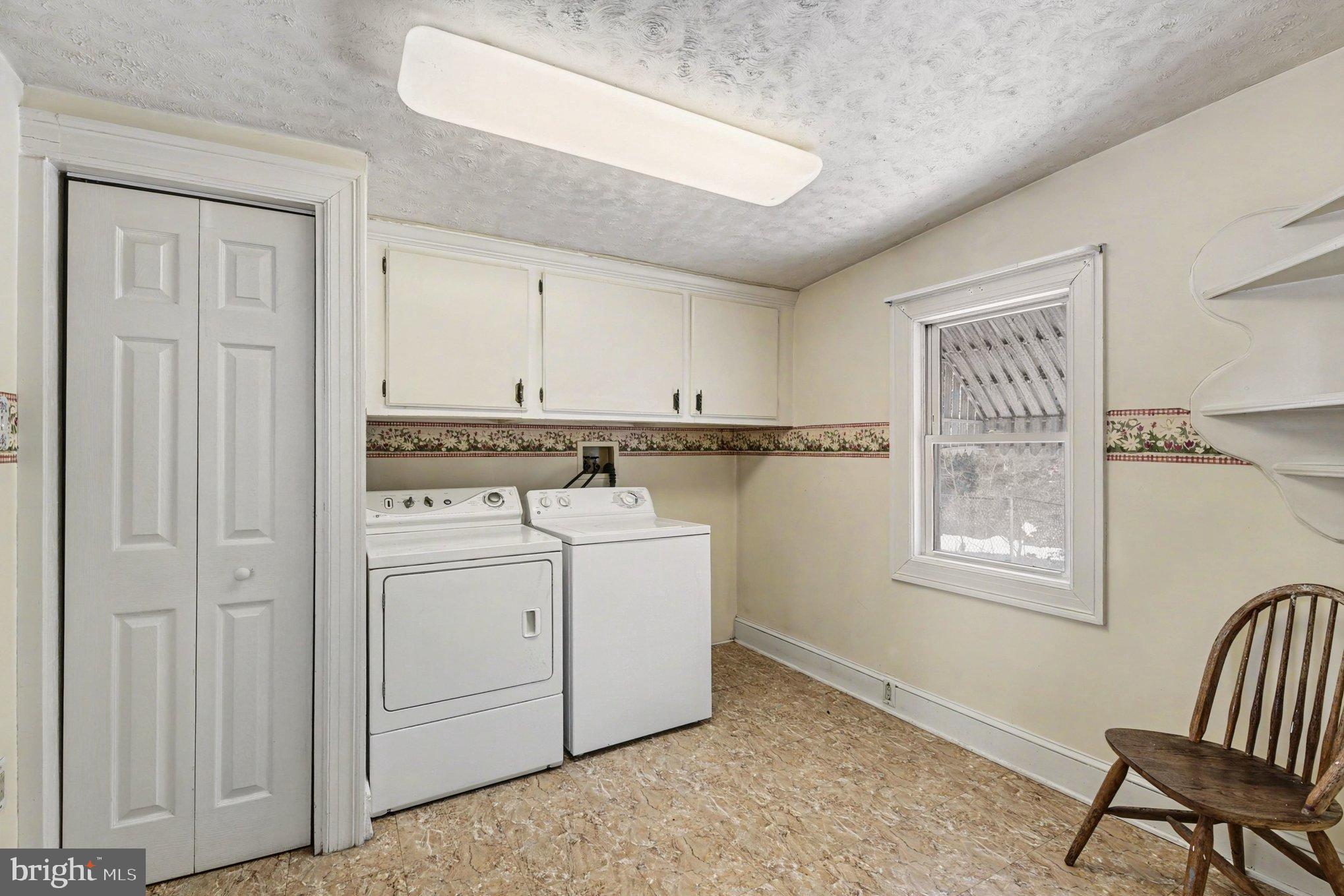 1433 Old Philadelphia Road Aberdeen, MD 21001 - Photo 14 of 32 a utility room with closet dryer and washer