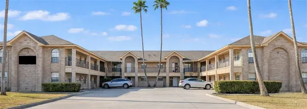 a front view of a building with street view