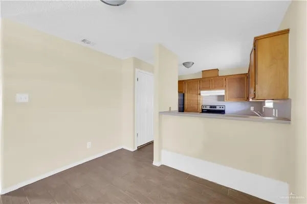a view of a kitchen with a sink