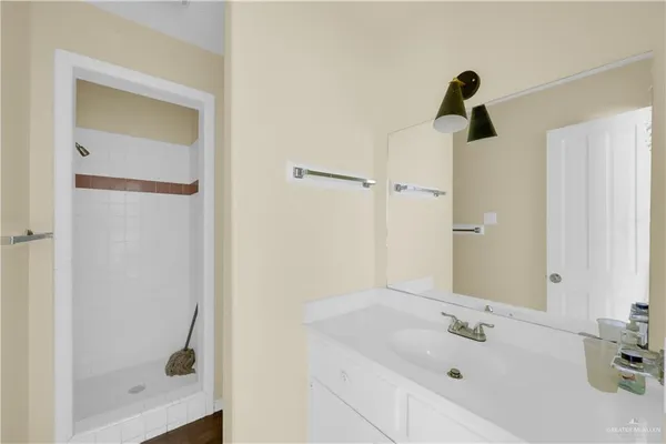 a bathroom with a tub and a sink