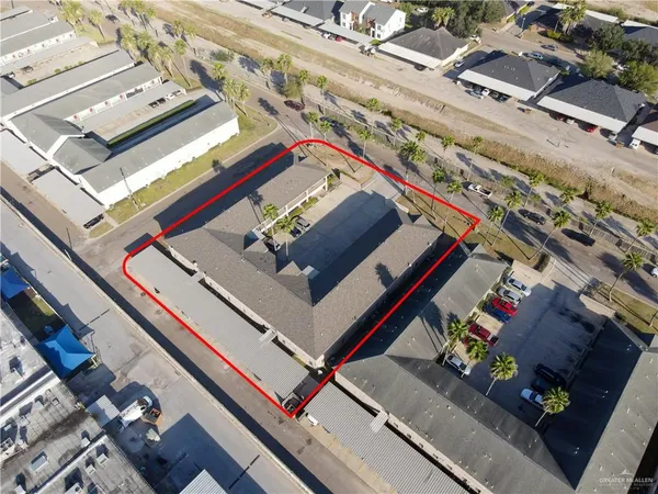 a picture of a living room with a bed