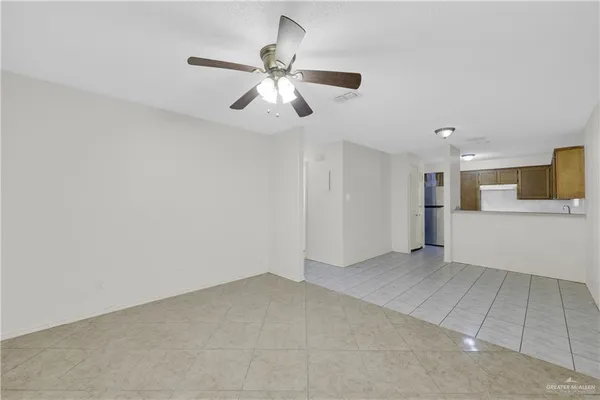 a view of a kitchen with a sink and cabinet area