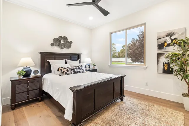 a view of a field of grass and a building