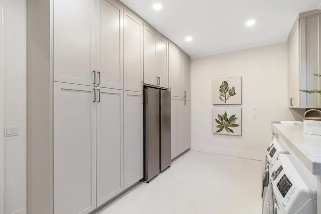 a bathroom with a sink a vanity and a mirror