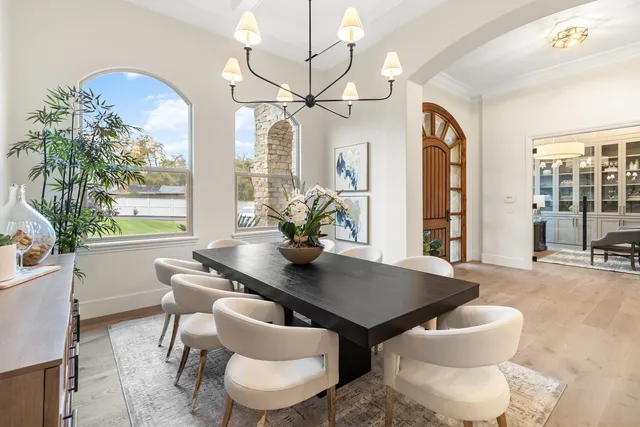 a living room with fireplace furniture and a flat screen tv