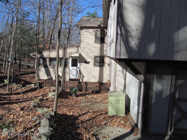 330 Canterbury Road Bushkill, PA 18324 - Photo 6 of 22 a view of a back yard of the house