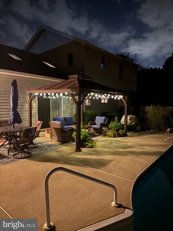 a view of house with yard