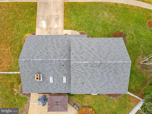 an aerial view of residential house with outdoor space