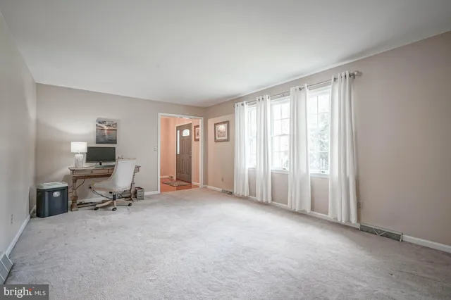 a view of a room with a window