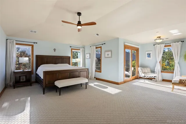 a front view of a house with swimming pool having outdoor seating